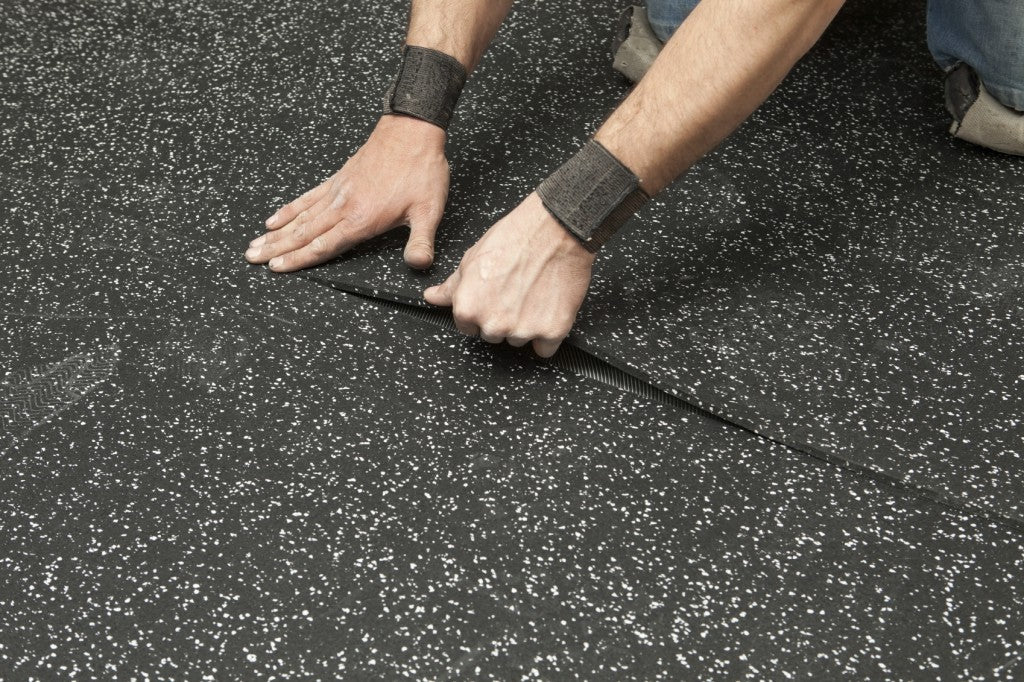 Classico Rubber Flooring 80% Recycled Black Rubber & 20% EPDM Granules High-Perf - installation view | rubberco.co.uk